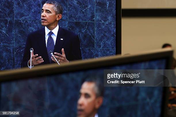 Viewed on monitors, U.S. President Barack Obama speaks at the United Nations General Assembly on September 24, 2013 in New York City. Over 120 prime...