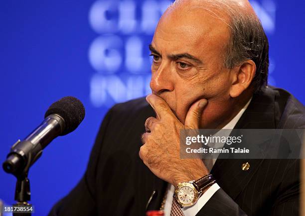 Muhtar Kent, Chairman and Chief Executive Officer of The Coca-Cola Company listens during a news conference at the Clinton Global Initiative meeting...