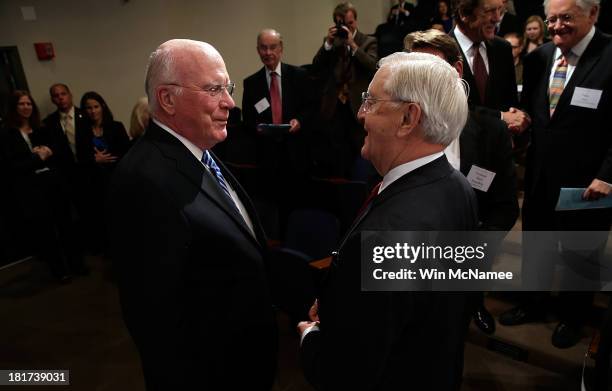 Sen. Patrick Leahy greets former U.S Vice President Walter Mondale at a Georgetown University Law Center discussion September 24, 2013 in Washington,...