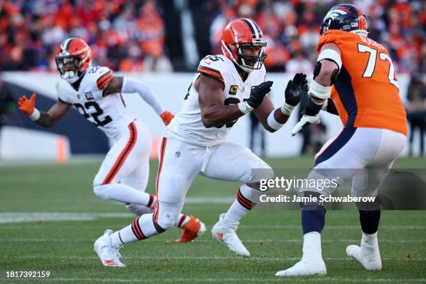 Myles Garrett of the Cleveland Browns rushes the passer against the Denver Broncos at Empower Field At Mile High on November 26, 2023 in Denver,...