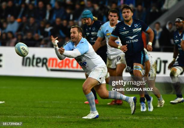 Bayonne's french fly-half Camille Lopez passes the ball during the French Top14 rugby union match between Aviron Bayonnais and Montpellier Herault...