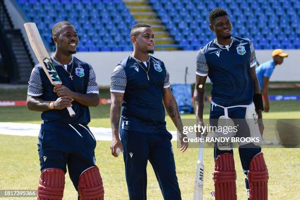 Sherfane Rutherford , Shimron Hetmyer and Alzarri Joseph of West Indies take part in a training session one day ahead of the 1st ODI between West...