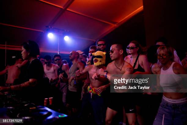 Festival-goers dance at a Boiler Room DJ set at Maho Rasop Festival 2023 on December 2, 2023 in Bangkok, Thailand.