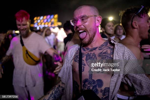 Festival-goers dance as Japanese punk rock band Otoboke Beaver perform at Maho Rasop Festival 2023 on December 2, 2023 in Bangkok, Thailand.