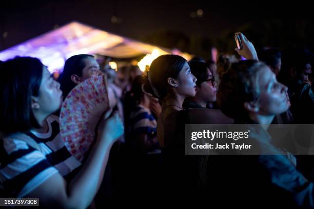 Festival-goers watch American rock band Caspian perform at Maho Rasop Festival 2023 on December 2, 2023 in Bangkok, Thailand.