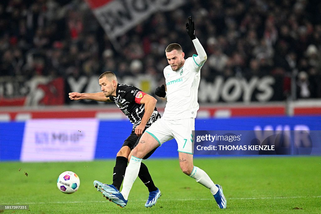 Ger Rabbette Stuttgart's German defender Waldemar Anton fights for the ball with ...