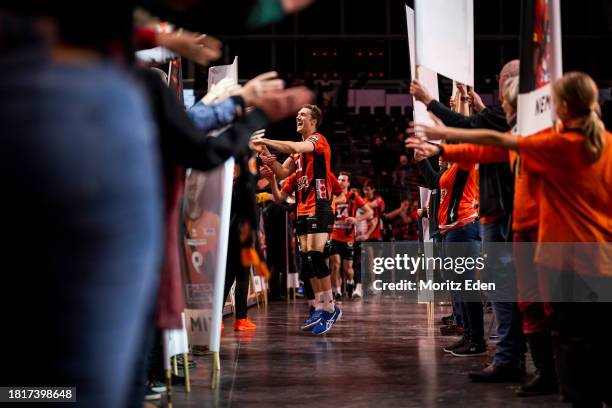 Cody Kessel of the BR Volleys celebrates the win after the Volleyball Bundesliga match between BR Volleys and ASV Dachau on December 2, 2023 in...