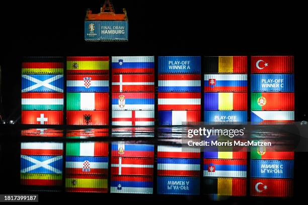 Stacked containers in the arrangement of the final draw stand at a terminal in the port of Hamburg at Elbphilharmonie on December 2, 2023 in Hamburg,...