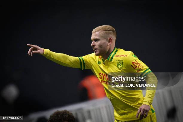 Nantes' French midfielder Florent Mollet celebrates after scoring a goal during the French L1 football match between FC Nantes and OGC Nice at La...