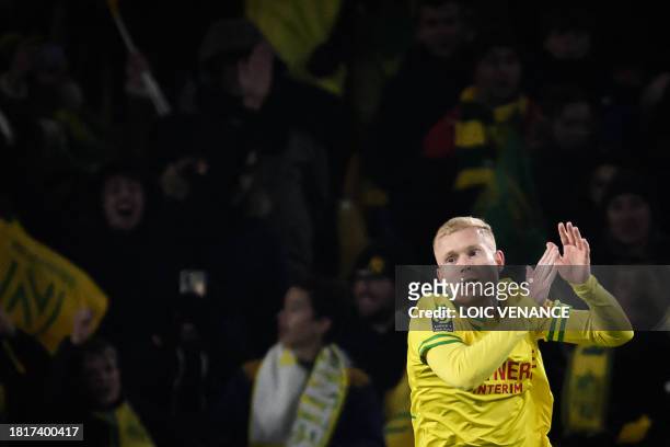 Nantes' French midfielder Florent Mollet celebrates after scoring a goal during the French L1 football match between FC Nantes and OGC Nice at La...