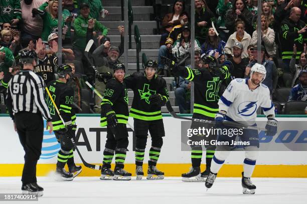 Joe Pavelski and the Dallas Stars celebrate a goal against the Tampa Bay Lightning at the American Airlines Center on December 2, 2023 in Dallas,...