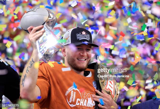 Quarterback Quinn Ewers of the Texas Longhorns celebrates after Texas defeated the Oklahoma State Cowboys in the Big 12 Championship at AT&T Stadium...