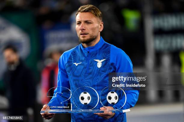 Ciro Immobile of SS Lazio receives an award for scoring 200 goals with SS Lazio before the Serie A football match between SS Lazio and Cagliari...