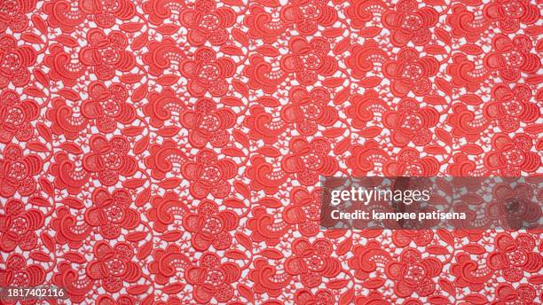 close-up of red lace contton fabrics abstract background - vintage lace stock pictures, royalty-free photos & images