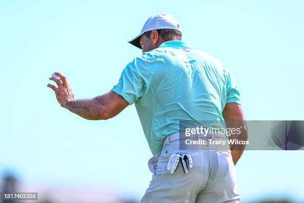 Tiger Woods waves during the third round of the Hero World Challenge at Albany Golf Course on December 2, 2023 in Naussau, New Providence, Bahamas.