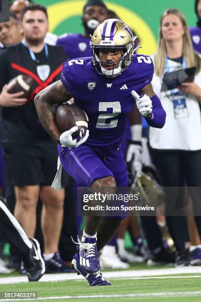 Washington Huskies wide receiver Ja'Lynn Polk runs after a catch during the PAC-12 Football Championship Game between the Oregon Ducks and the...