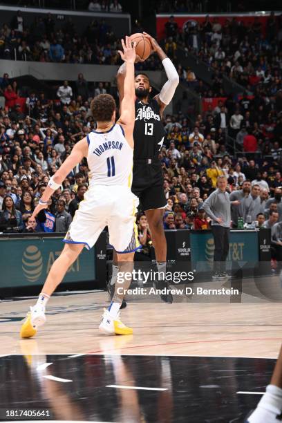 Paul George of the LA Clippers scores the game winning basket against the Golden State Warriors on December 2, 2023 at Crypto.Com Arena in Los...