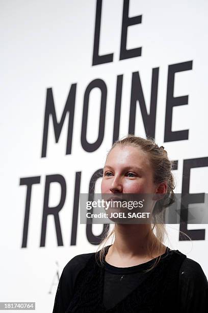 French designer Alice Lemoine poses as her creations are on display during the 2014 Spring/Summer ready-to-wear collection fashion presentation, on...