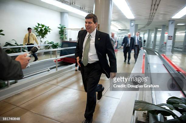 September 24: Sen. Mark Begich, D-AK., is running to vote as he arrive at Senate policy luncheons through the Senate subway in the U.S. Capitol on...