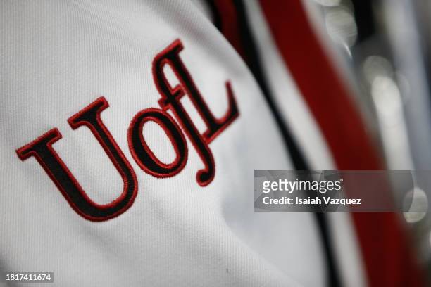 The University of Louisville logo is shown on a marching band jacket before the ACC Championship between the Florida State Seminoles and the...