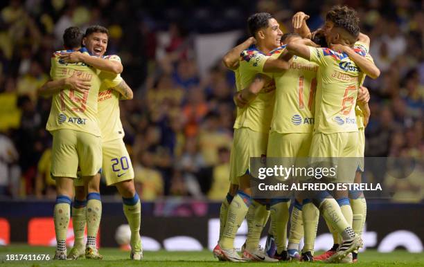 America's players celebrate their second goal during the Mexican Apertura 2023 tournament quarterfinal football match between America and Leon at...