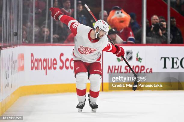 Jake Walman of the Detroit Red Wings celebrates his overtime goal against the Montreal Canadiens at the Bell Centre on December 2, 2023 in Montreal,...