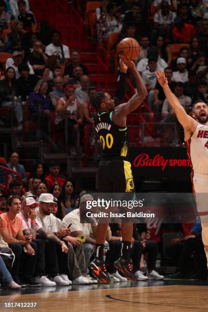 Bennedict Mathurin of the Indiana Pacers shoots a three point basket during the game against the Miami Heat on December 2, 2023 at Kaseya Center in...