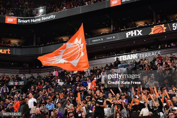 Fans cheer during the Memphis Grizzlies game against the Phoenix Suns on December 2, 2023 at Footprint Center in Phoenix, Arizona. NOTE TO USER: User...