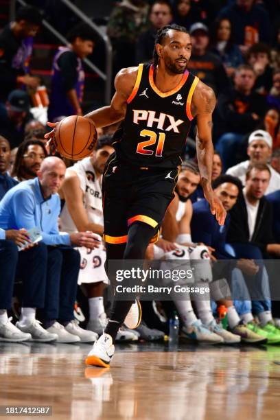 Keita Bates-Diop of the Phoenix Suns dribbles the ball during the game against the Memphis Grizzlies on December 2, 2023 at Footprint Center in...