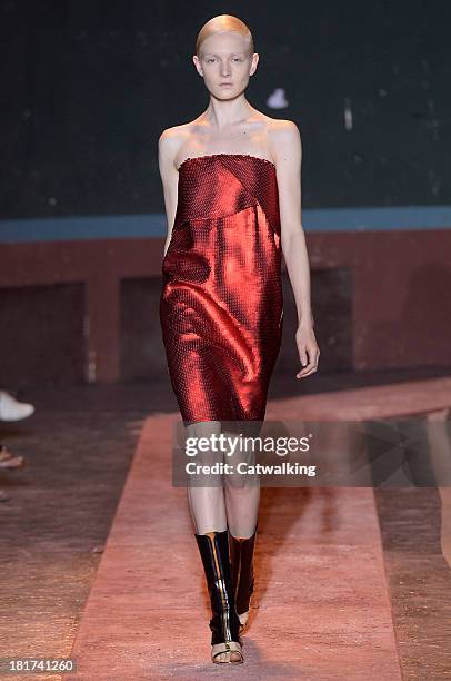 Model walks the runway at the Cedric Charlier Spring Summer 2014 fashion show during Paris Fashion Week on September 24, 2013 in Paris, France.