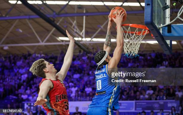 Mitchell of the Bullets dunks the ball during the round nine NBL match between Brisbane Bullets and Illawarra Hawks at Nissan Arena, on December 3 in...