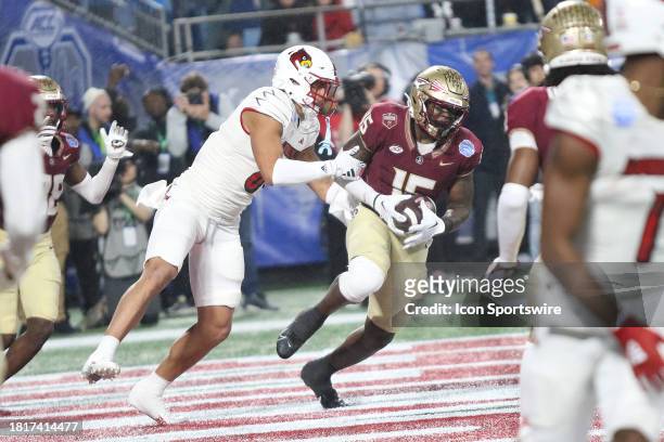 Florida State Seminoles linebacker Tatum Bethune intercepts a pass in the end zone during the ACC Football Championship Game between the Louisville...