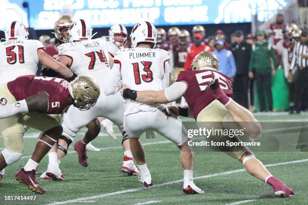 Florida State Seminoles defensive lineman Braden Fiske grabs Louisville Cardinals quarterback Jack Plummer for a sack during the ACC Football...