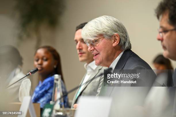 In this handout image suppled by COP28, Andrew Mitchell, Minister of State of the United Kingdom for Development and Africa, speaks at the Taking...
