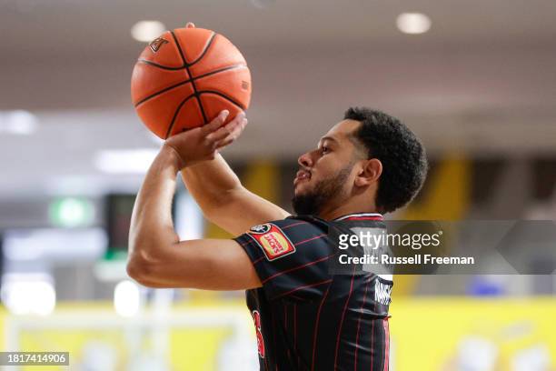 Tyler Harvey of the Hawks warms up prior to the round nine NBL match between Brisbane Bullets and Illawarra Hawks at Nissan Arena, on December 3 in...