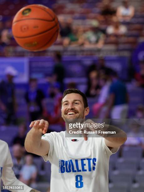 Mitch Norton of the Bullets warms up prior to the round nine NBL match between Brisbane Bullets and Illawarra Hawks at Nissan Arena, on December 3 in...