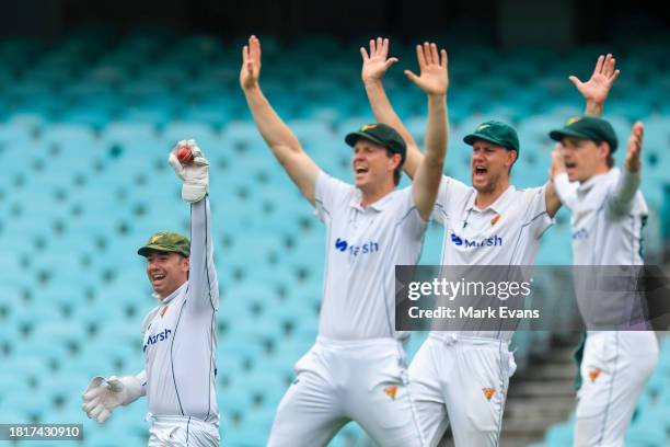 Jake Doran of the Tigers appeals unsuccessfully for a caught behind during the Sheffield Shield match between New South Wales and Tasmania at SCG, on...