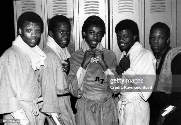 Singers Ronnie DeVoe, Bobby Brown, Ralph Tresvant, Ricky Bell and Michael Bivins of New Edition poses for photos backstage at Screamin' Wheels Roller...