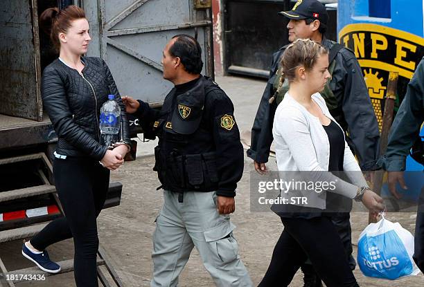 Irishwoman Michaella McCollum and Briton Melissa Reid walk into the Sarita Colonia Jailhouse Court in the port of Callao, west of Lima, on September...
