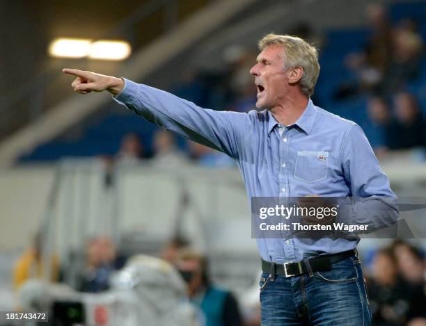 Head coach Rudi Bommer of Cottbus gestures during the DFB Cup second round match between TSG 1899 Hoffenheim and FC Energie Cottbus at Wirsol...
