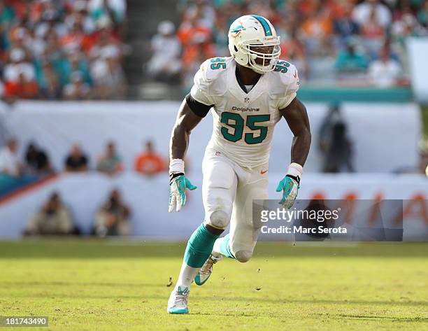 Defensive lineman Dion Jordan of the Miami Dolphins lines up against the Atlanta Falcons at Sun Life Stadium on September 22, 2013 in Miami Gardens,...