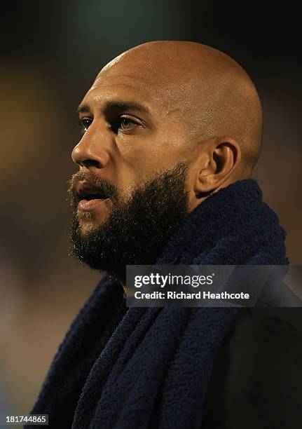 Everton goalkeeper Tim Howard walks out for the warm up during the Captial One Cup Third Round match between Fulham and Everton at Craven Cottage on...