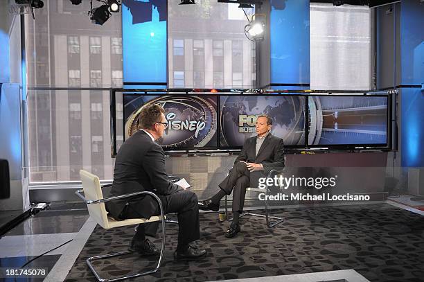 Fox Business Correspondent Dennis Kneale and Disney CEO Robert Iger talk on FOX Business Network's "Markets Now" at FOX Studios on September 24, 2013...