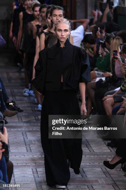 Model walks the runway during the Moon Young Hee show as part of the Paris Fashion Week Womenswear Spring/Summer 2014 on September 24, 2013 in Paris,...