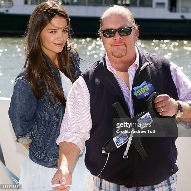 Katie Holmes and Chef Mario Batali attend the Hellmann's 100th Birthday Event at Pier 84 on September 24, 2013 in New York City.