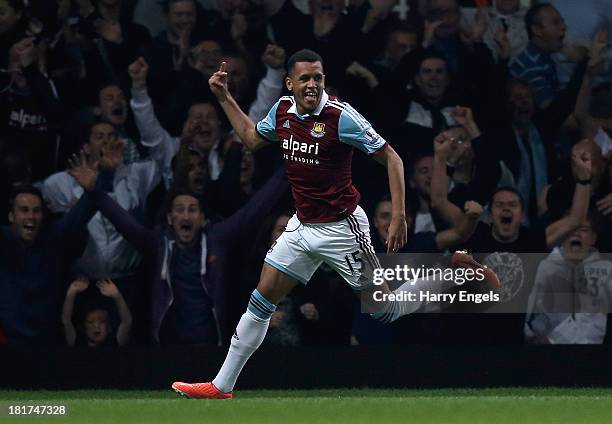 Ravel Morrison of West Ham celebrates scoring his side's first goal during the Capital One Cup third round match between West Ham United and Cardiff...