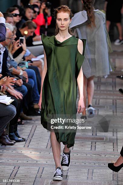 Model walks the runway during the Moon Young Hee show as part of the Paris Fashion Week Womenswear Spring/Summer 2014 on September 24, 2013 in Paris,...