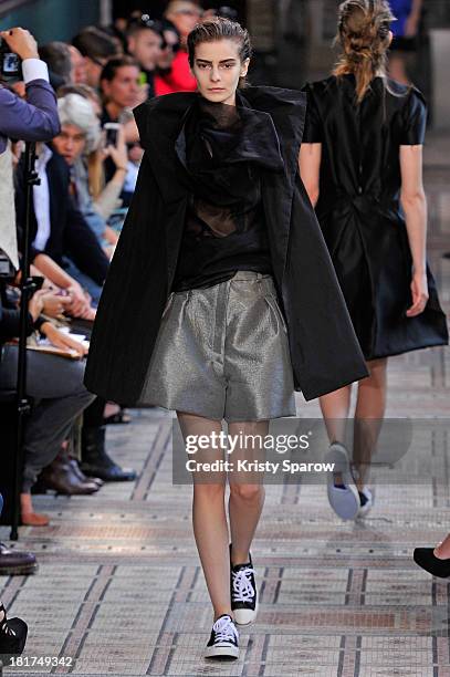 Model walks the runway during the Moon Young Hee show as part of the Paris Fashion Week Womenswear Spring/Summer 2014 on September 24, 2013 in Paris,...