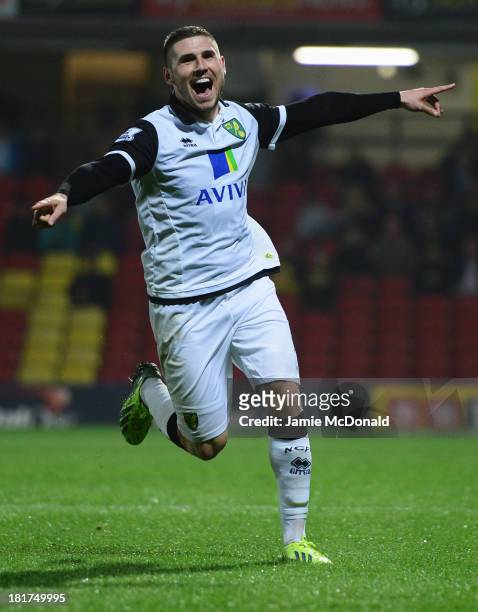 Gary Hooper of Norwich City celebrates as he scores their third goal during the Capital One Cup Third Round match between Watford and Norwich City at...