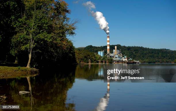 Plume of exhaust extends from the Mitchell Power Station, a coal-fired power plant built along the Monongahela River, 20 miles southwest of...